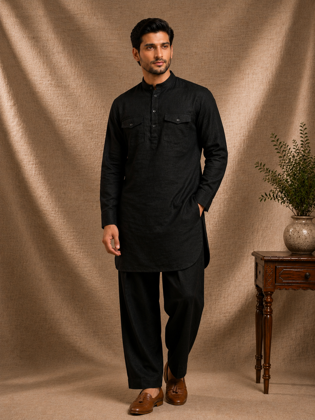 Man wearing jet black linen pathani kurta with dual chest flap pockets and matching salwar mandarin collar mens premium ethnic co-ord set Ethnoir